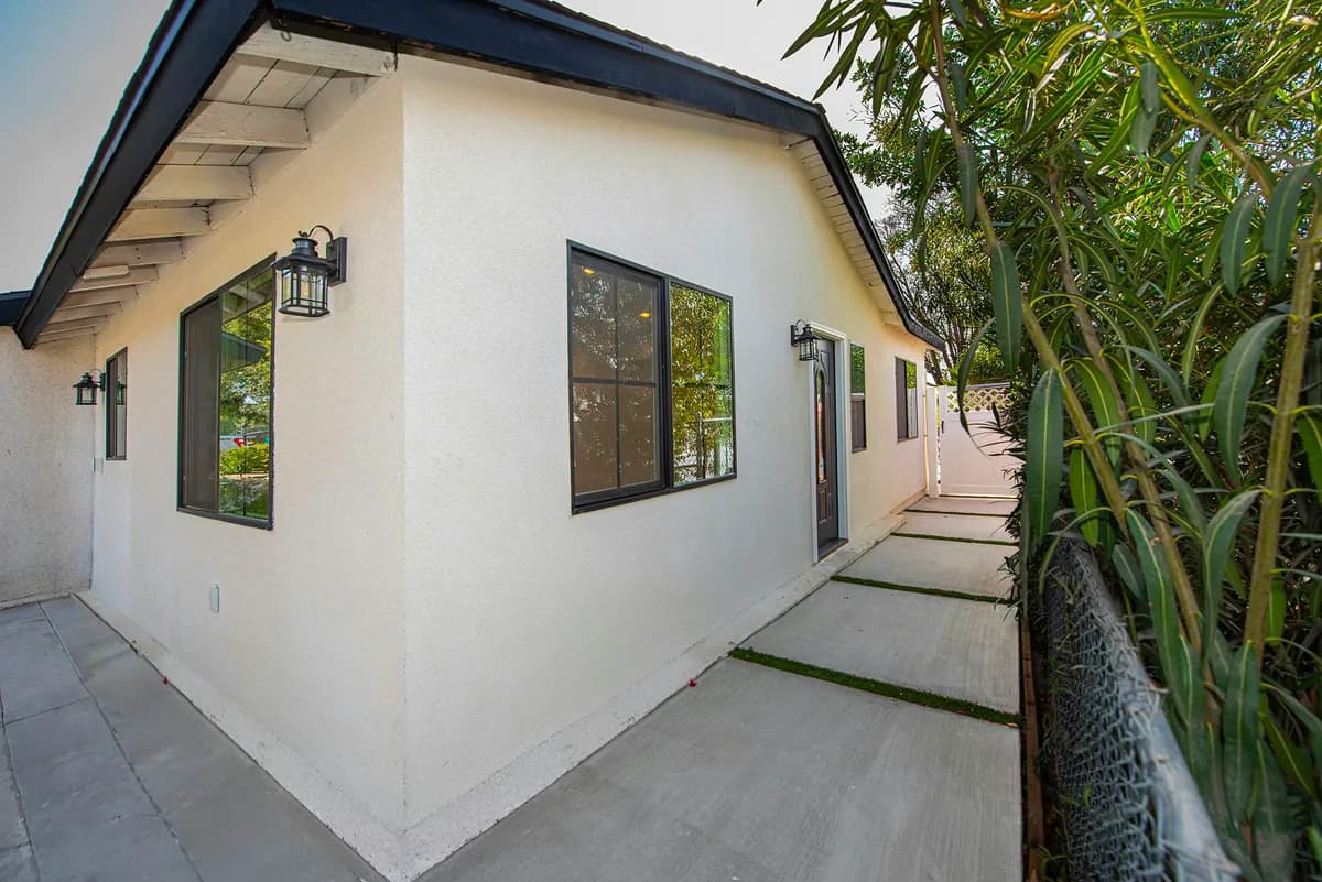 Completed ADU exterior by Yeganeh Inc. at dusk