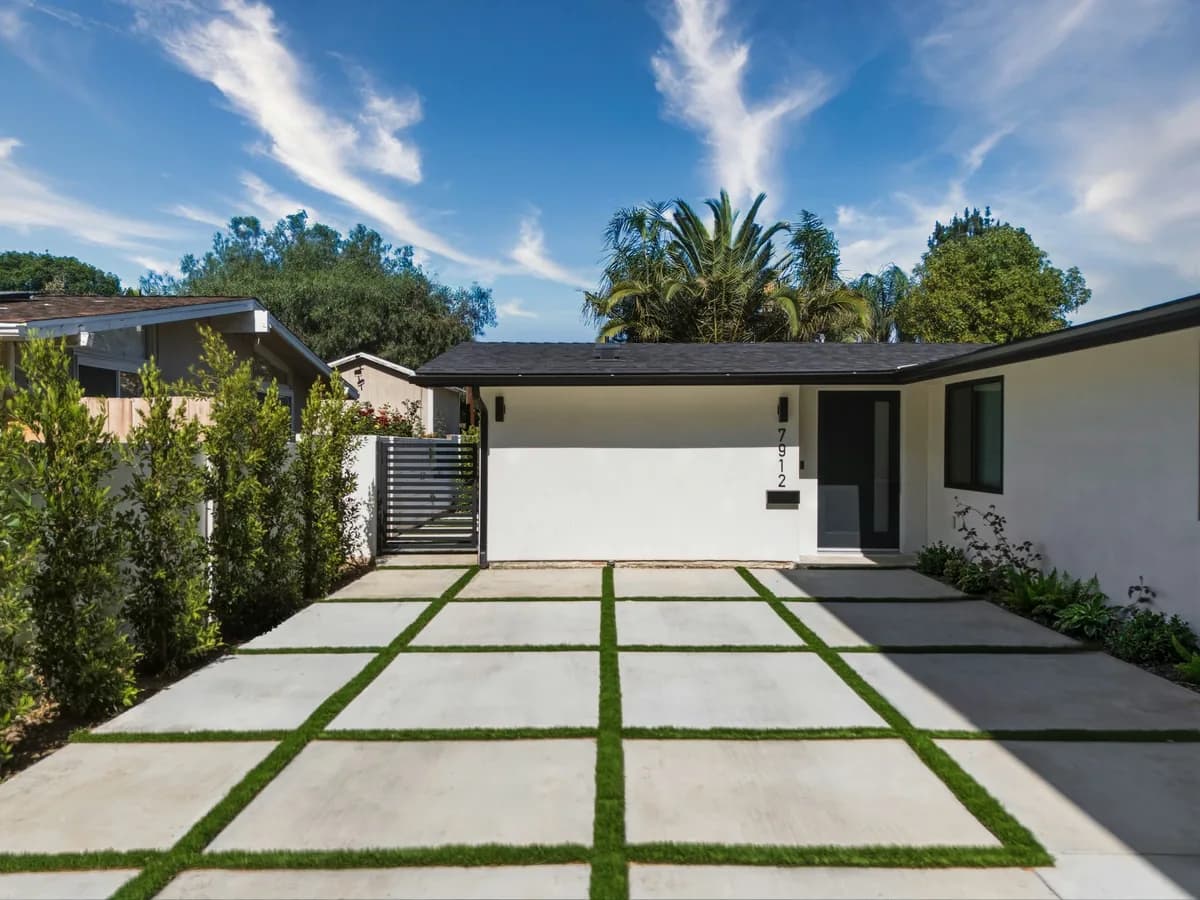 Completed single-storey residential project by Yeganeh Inc., with a new driveway and landscaping